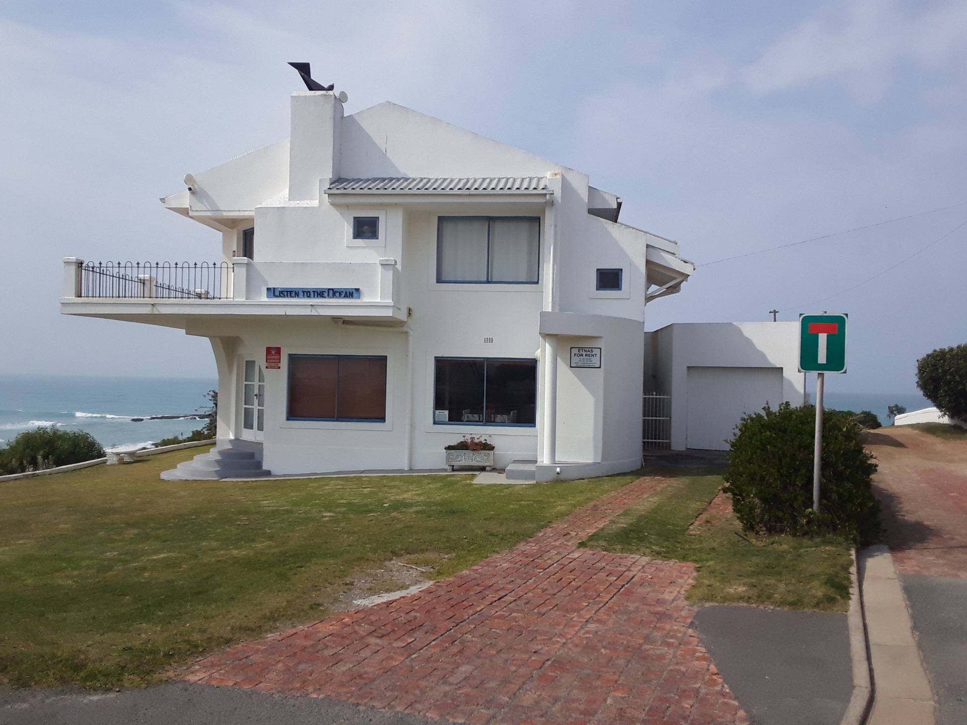 A more modern house with front row view of the sea.