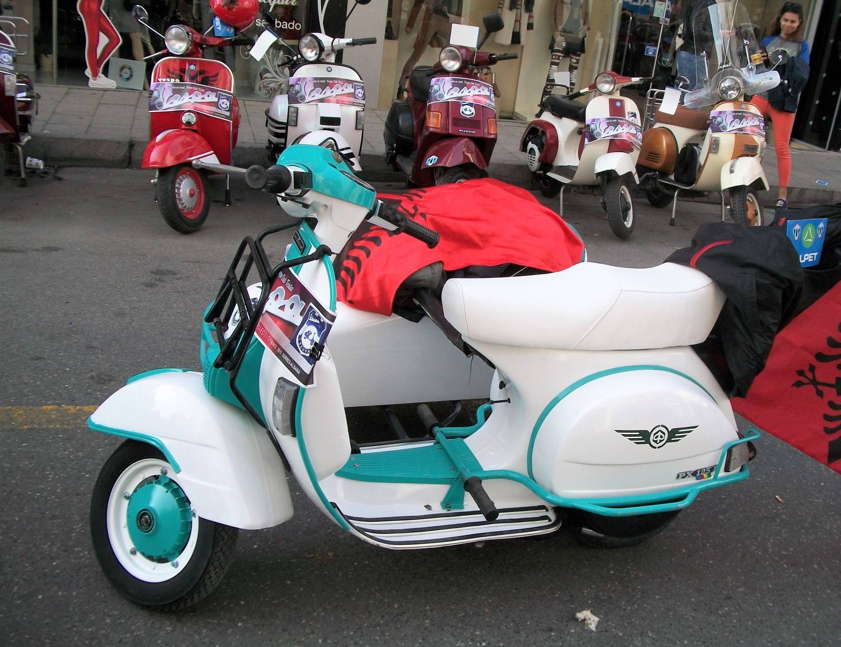 a clean PX125 with matching sidecar