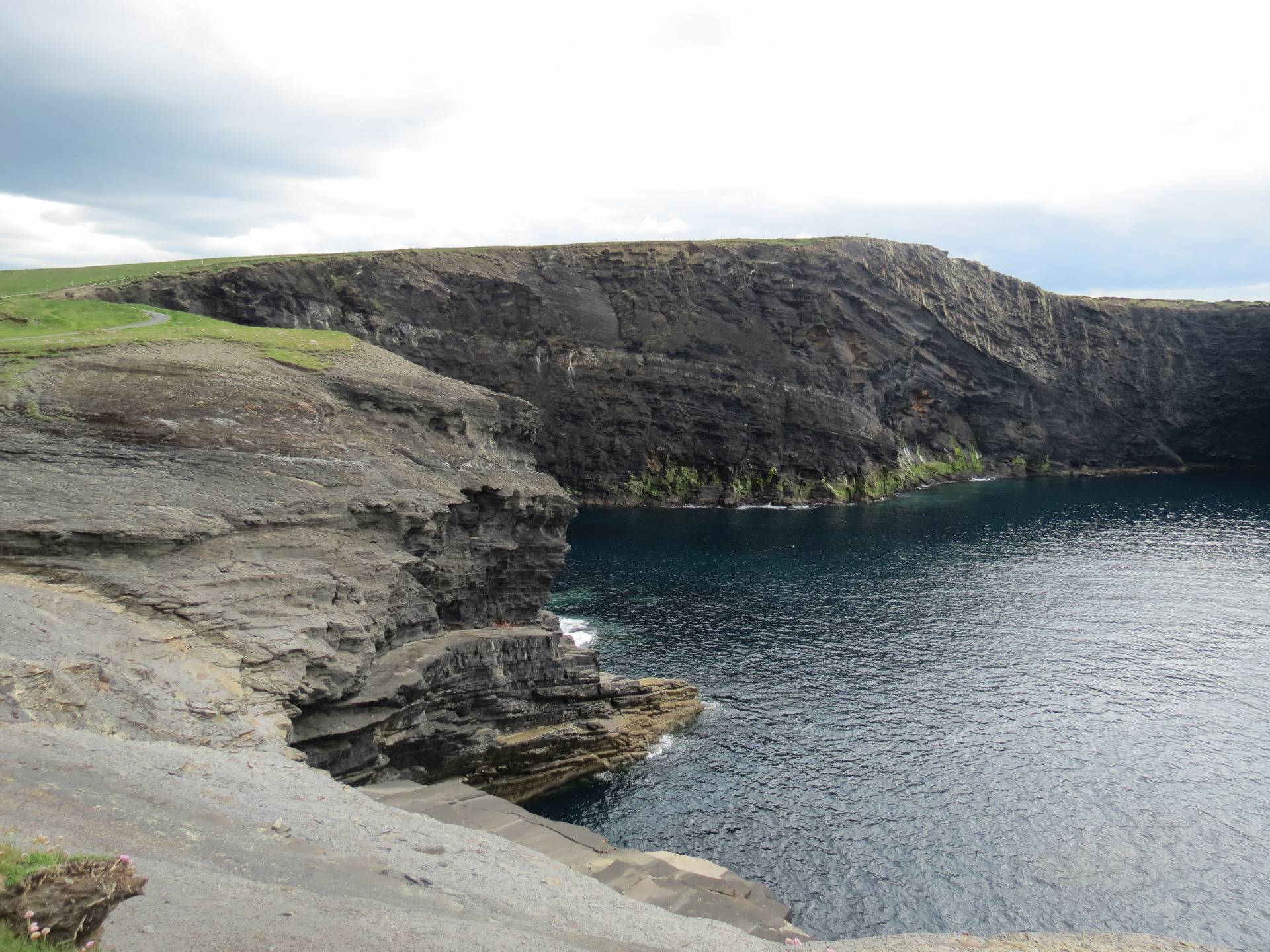 Wild Atlantic Way. Cliffs at Kilkee in Ireland, limpets, barnacles and other oceanic curiosities.
