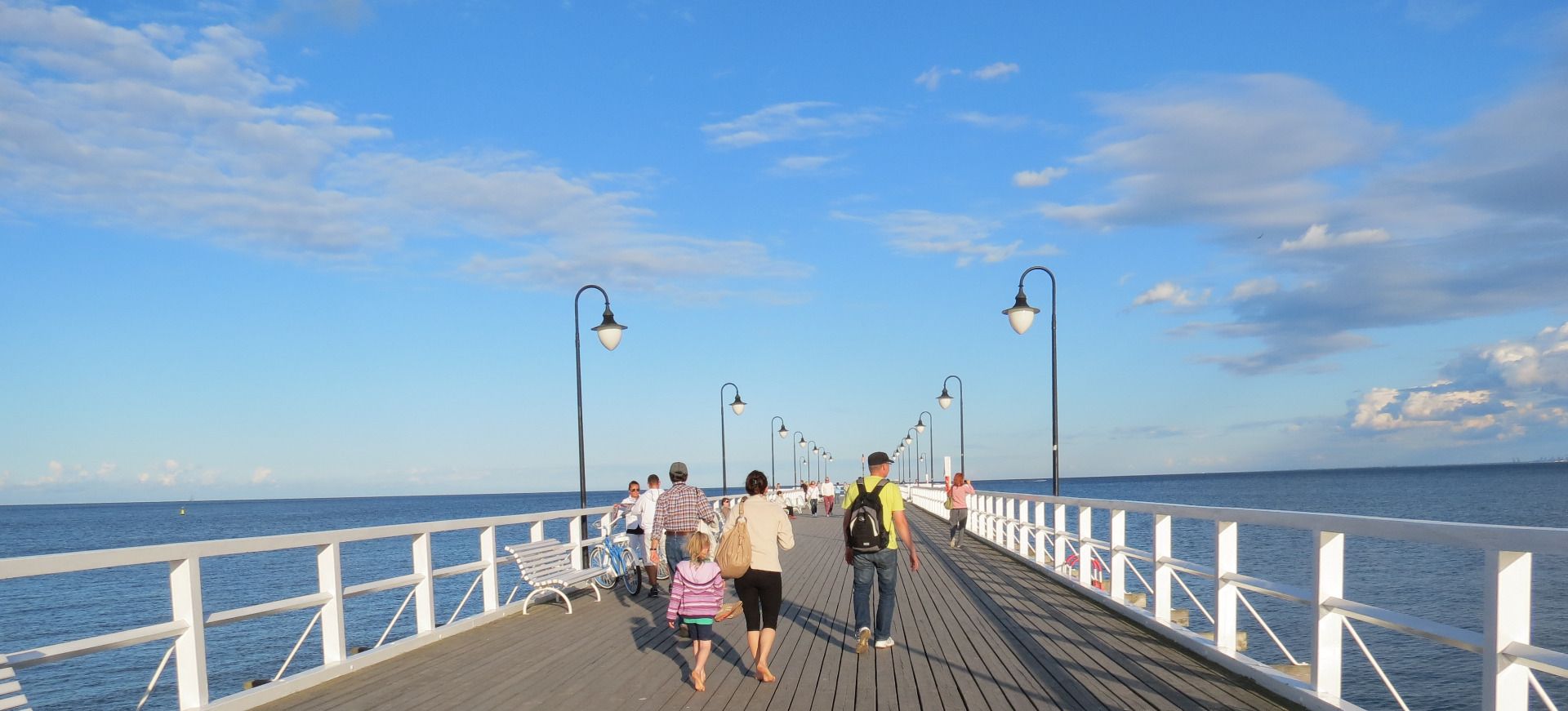 Amazing white pier on the Baltic Sea, pirate ship and beautiful beaches nearby