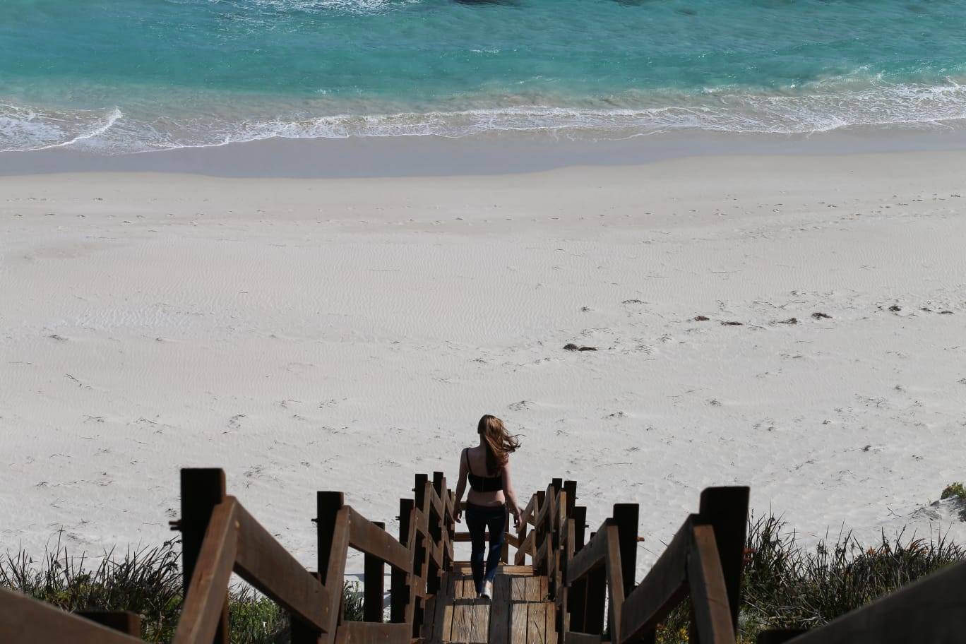 Me running down a nice steep wooden staircase to the beach - especially for the photo lol
