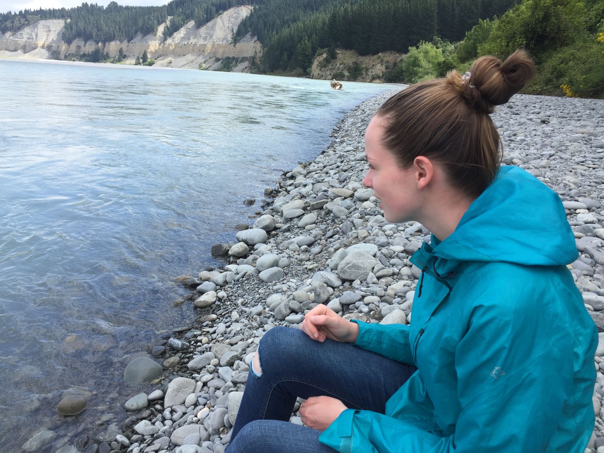 My sister sitting sitting at the riverside :)