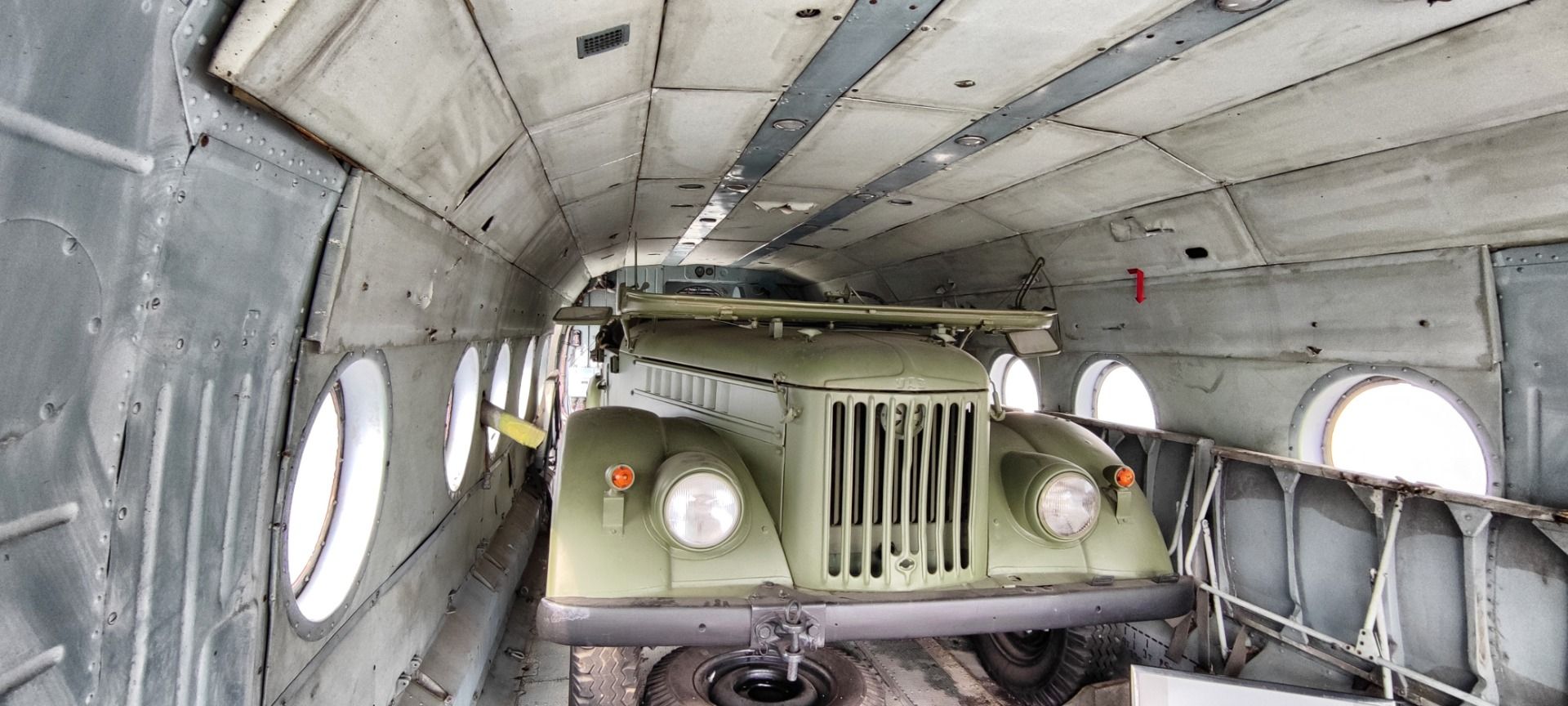 A jeep inside an airplane