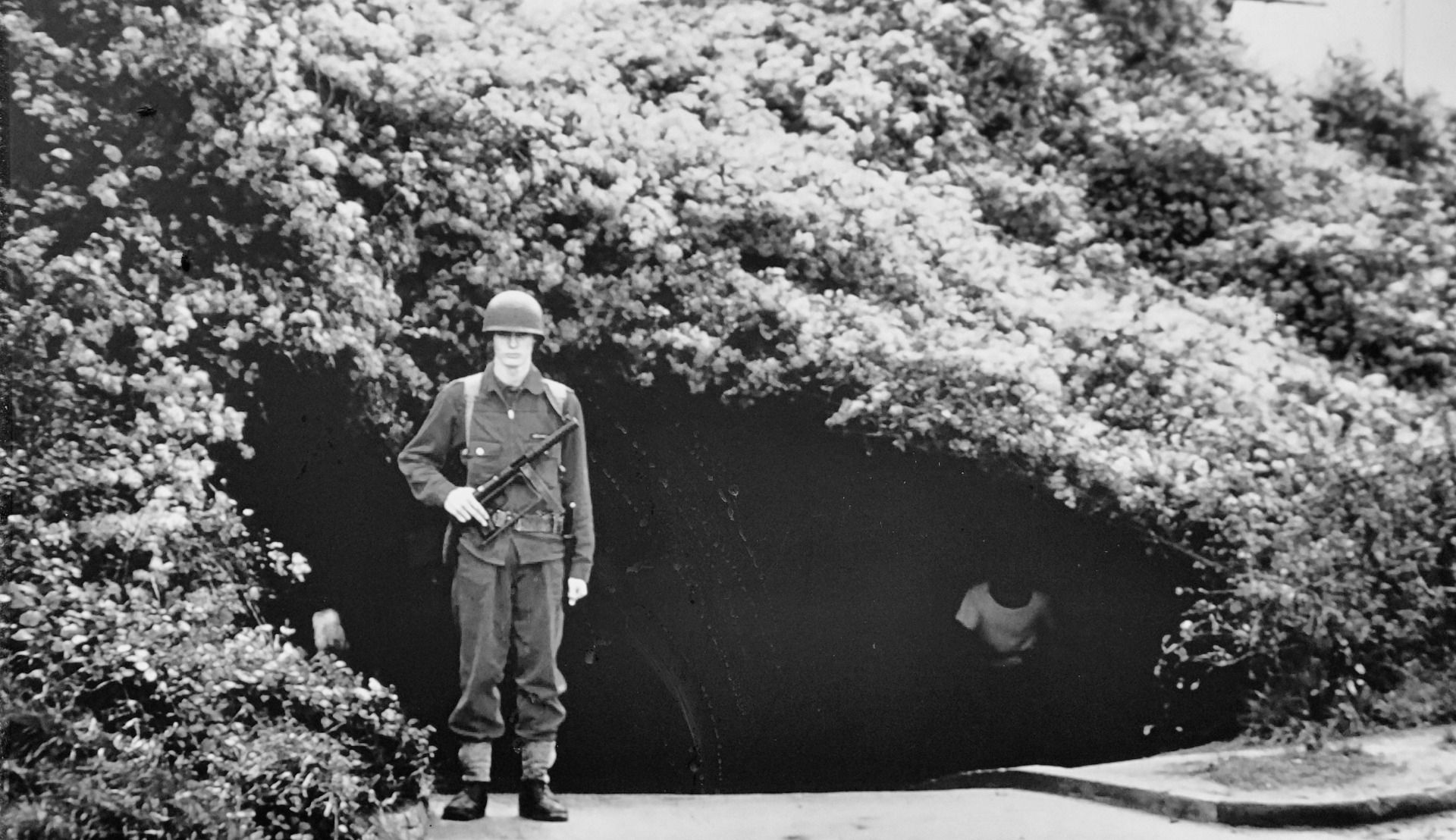 A Soldier in front of the bunker at the Cold War era