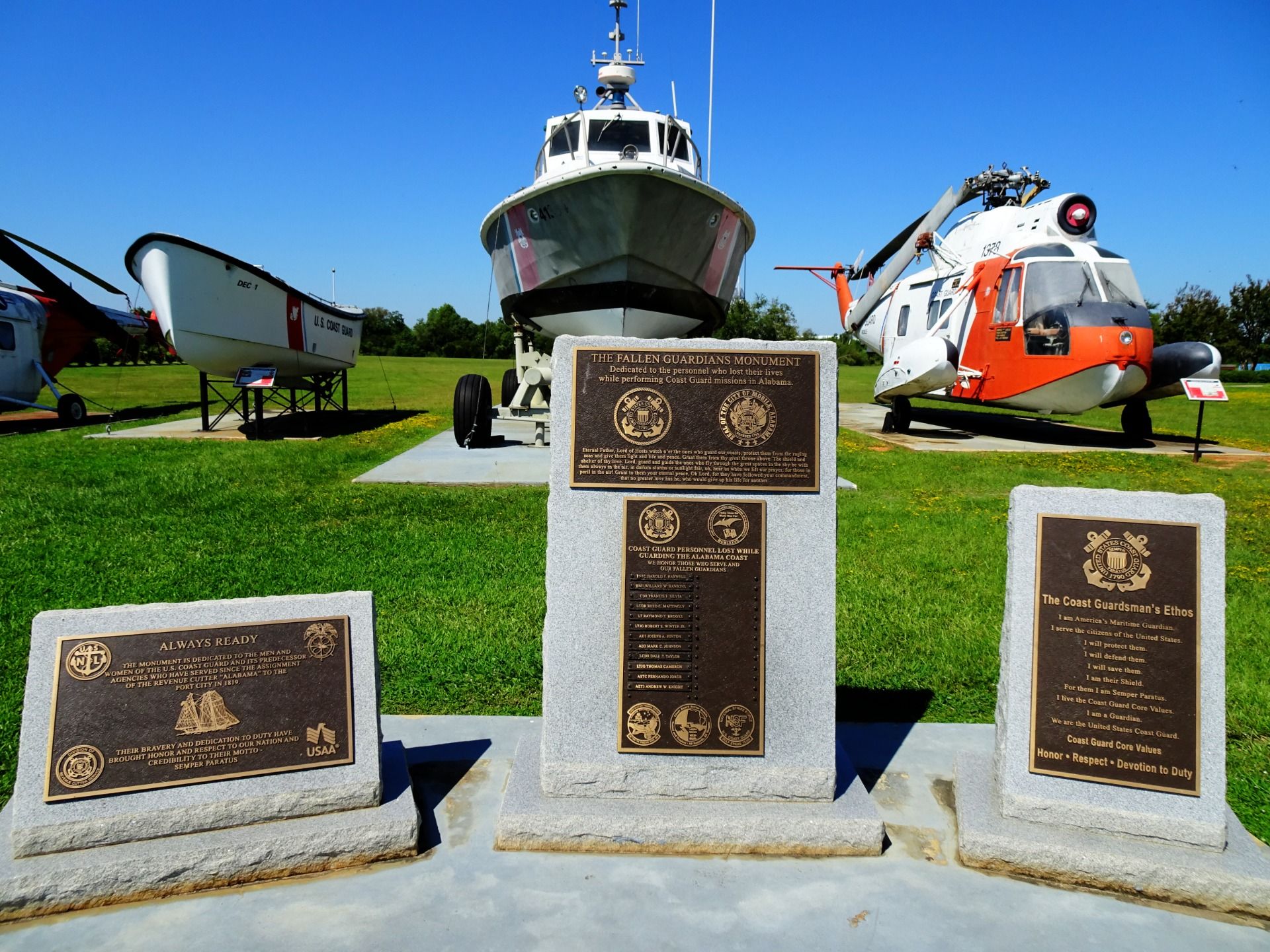 An exhibition of boats and helicopters waits outside