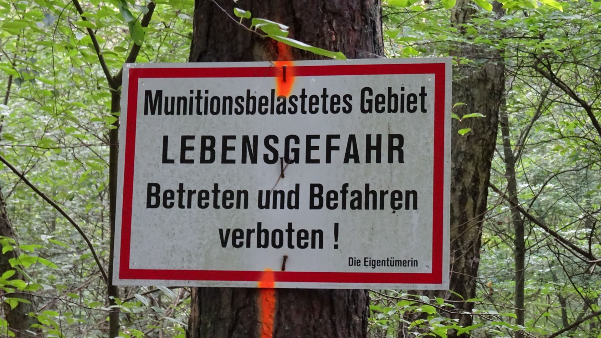 Warning signs at the edge of the zone