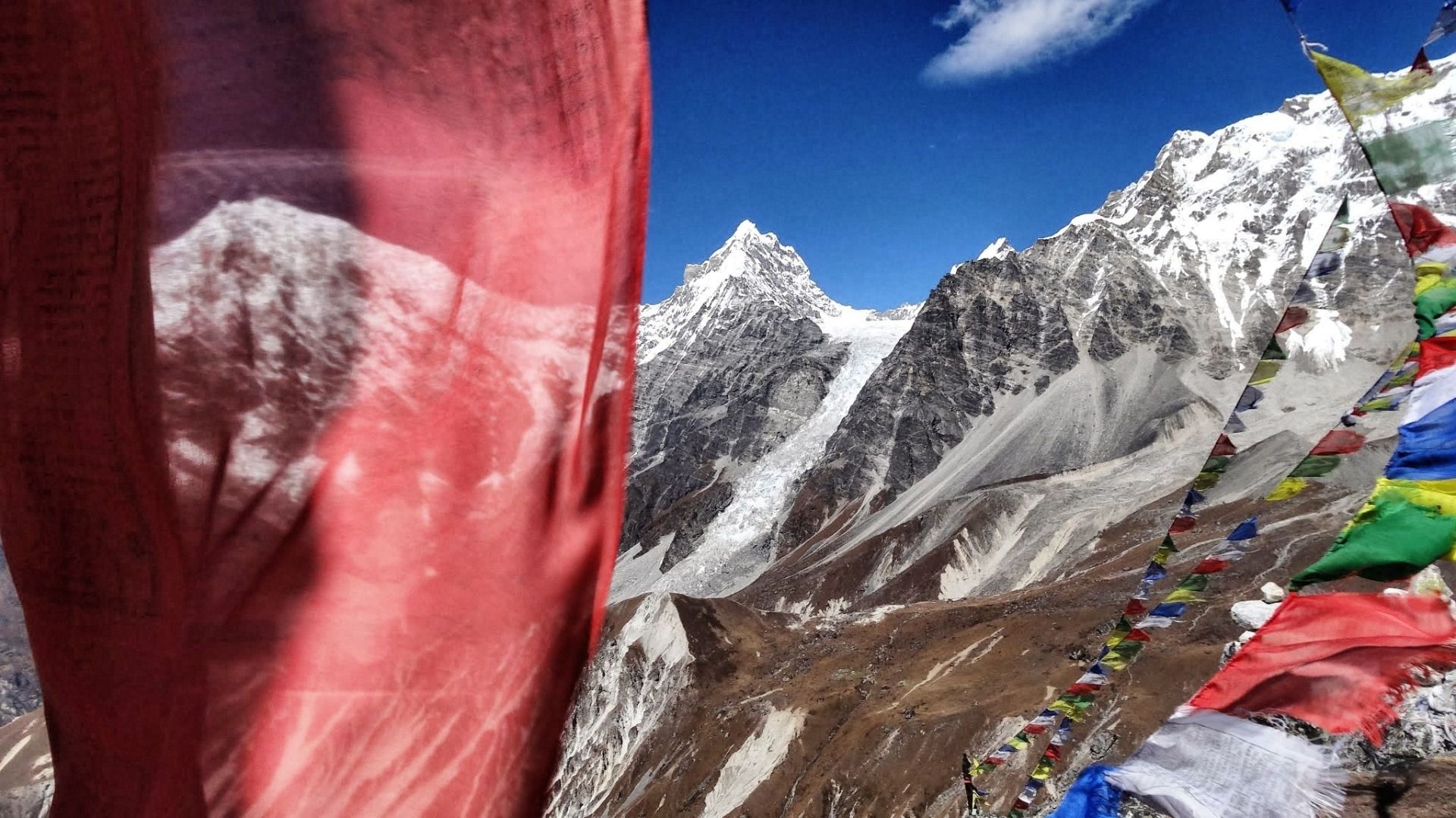 Sweet snacks under prayer flags.
