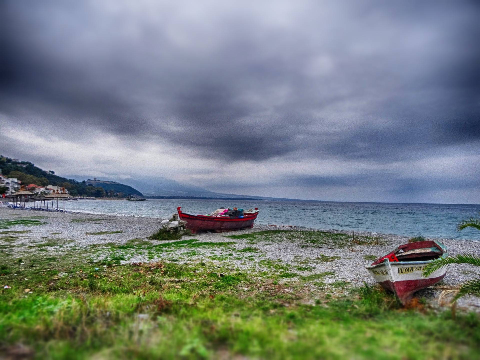 Two lost boats swimming at the shore