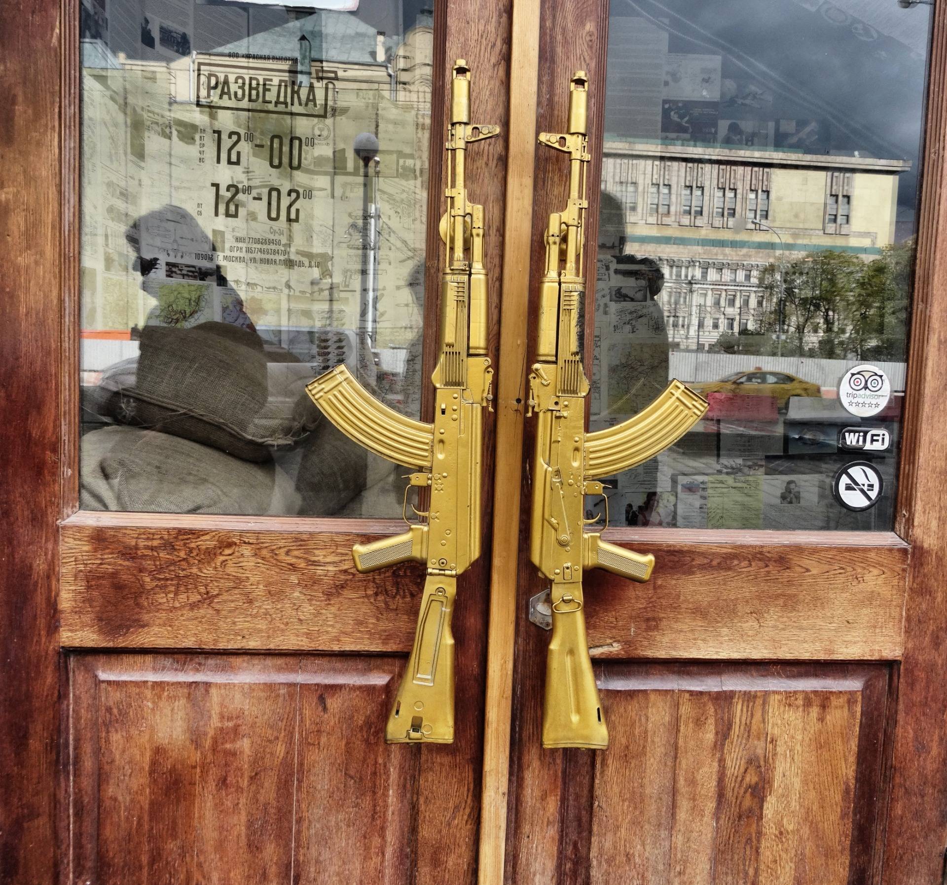 Two Kalashnikovs guns as a door knub