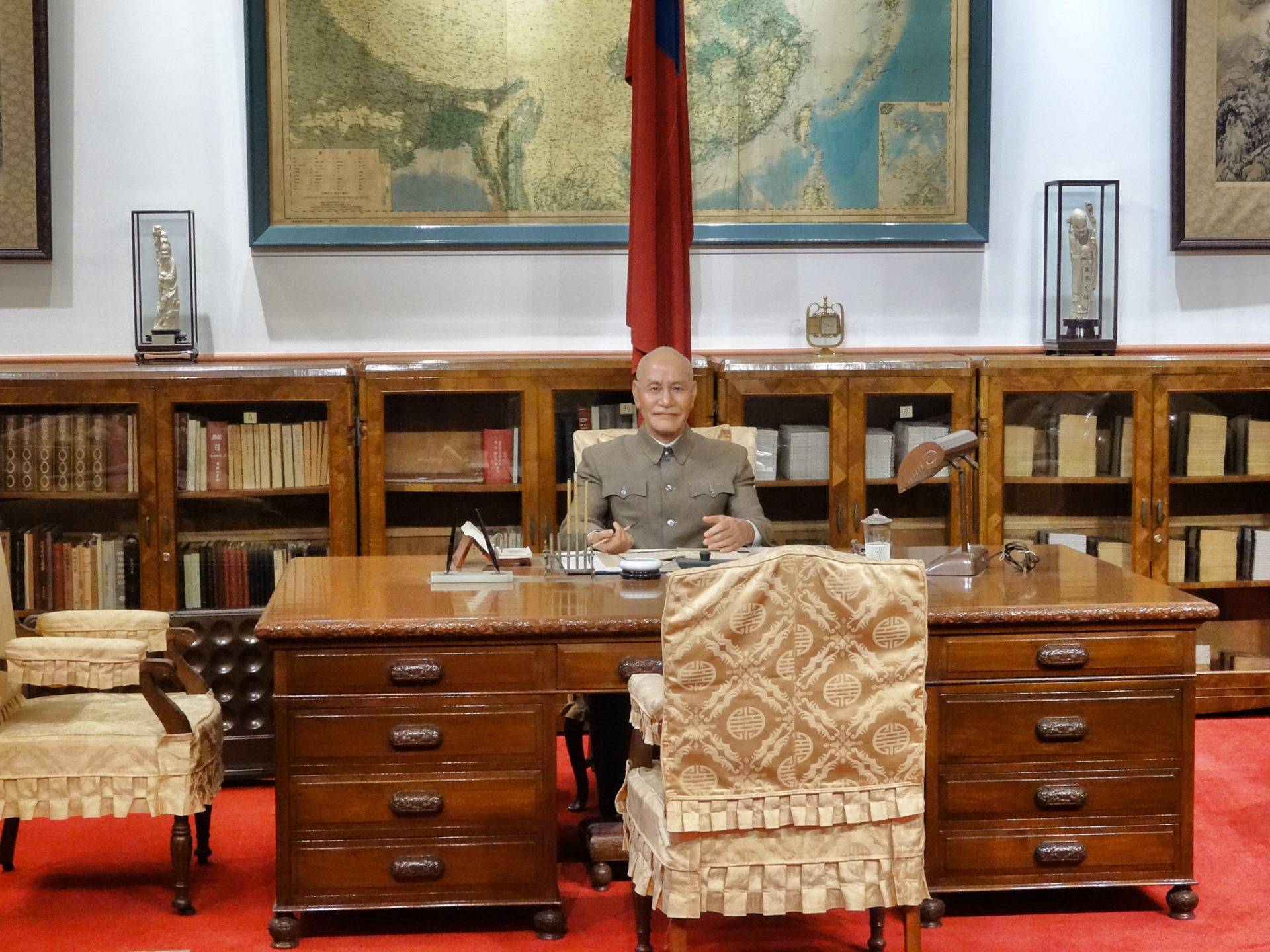 Chiang Kai-shek or ”CKS” himself is sitting behind the door