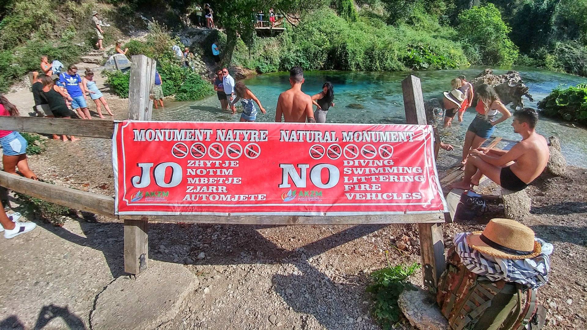 The natural monument sign with ”No swimming” warning