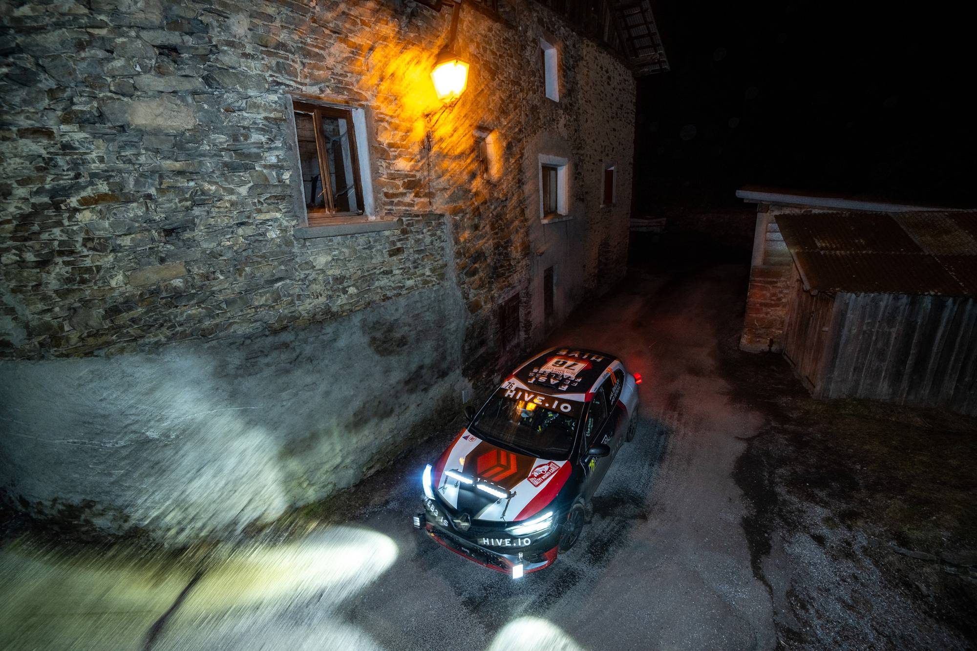 Hive rally car during a night time rally stage at Rallye Monte Carlo 2024
