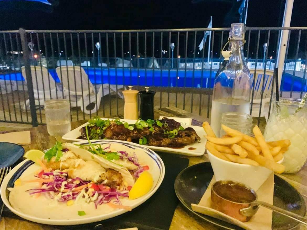 Slow cooked sticky pork ribs, and fish tacos for dinner. Awesome poolside restaurant, that’s also a popular watering hole for tourists and locals.