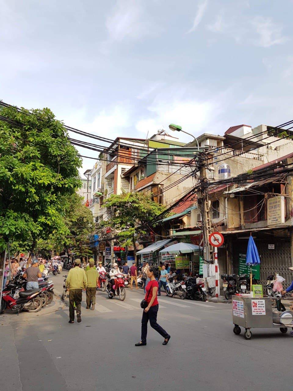 Hanoi, Vietnam. So many people! And, there are very few traffic lights.