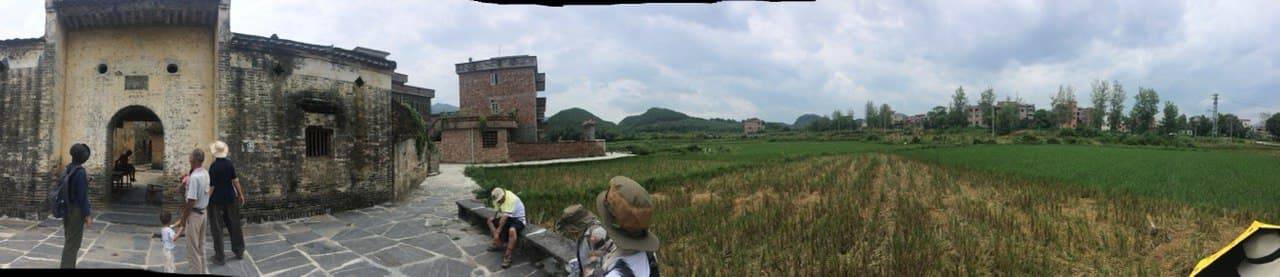 From right next to the village entrance, there is a vast field where village people work and cultivate rice and many different kinds of veggies.