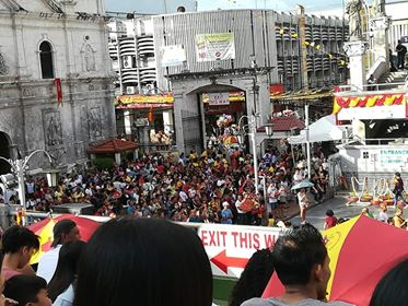 crowd near the church