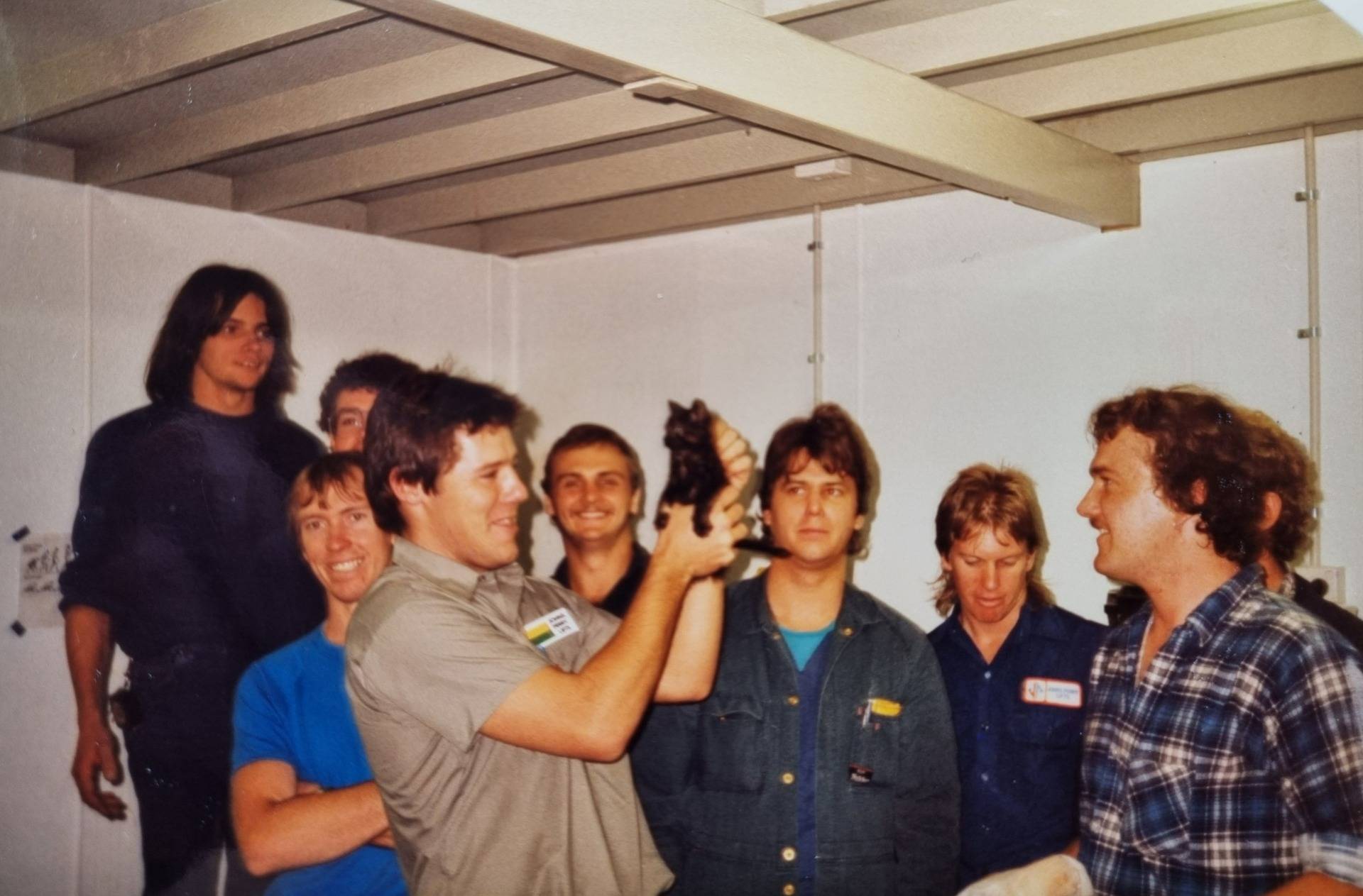 The Johns Perry Lifts crew and the kitten that became our mascot (found living in our lunch room).