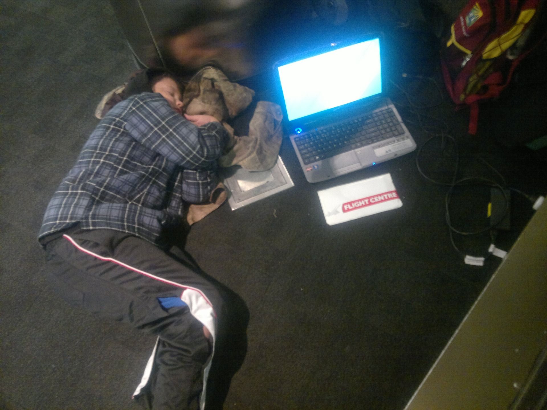 He must have had a good time, totally crashed out waiting to board our flight home.