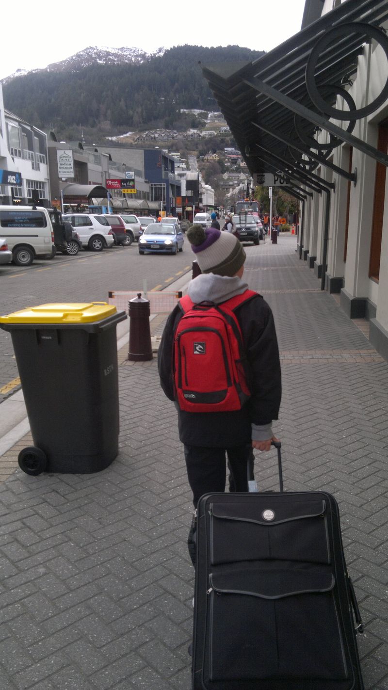One of my favorite photos of my little man growing up. Happy to carry all this own bags to catch the bus back to the airport for the flight home. After a great week snow boarding.