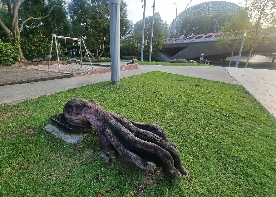 The Esplanade Park Children’s play ground and a wooden carving of an octopus