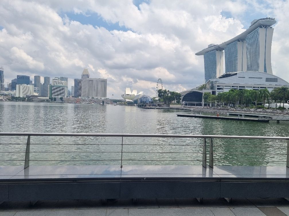 The clam shaped science building, the Singapore Flyer and Marina Bay Sand building.