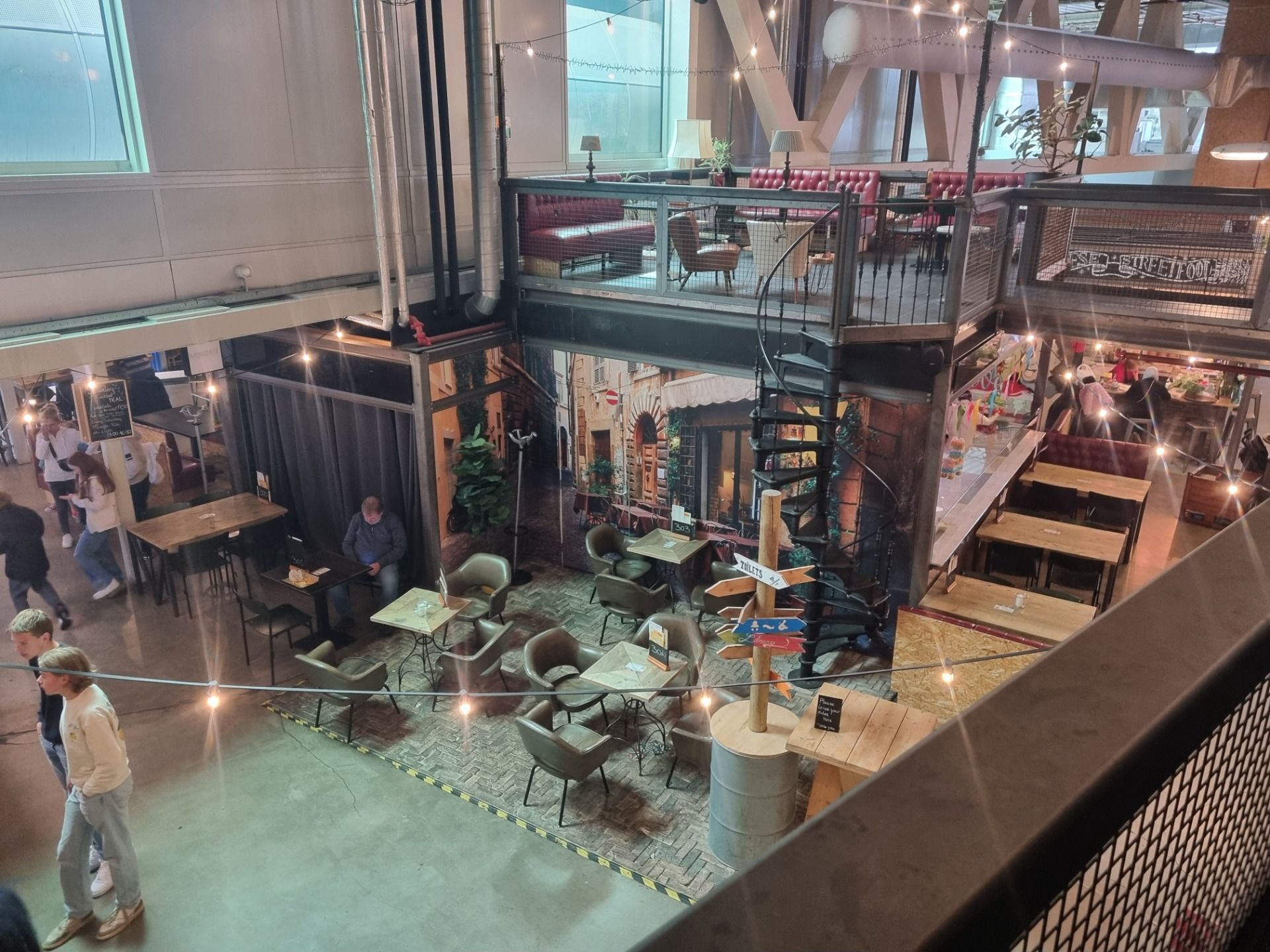 We had lunch in a food hall next to the empty train station.