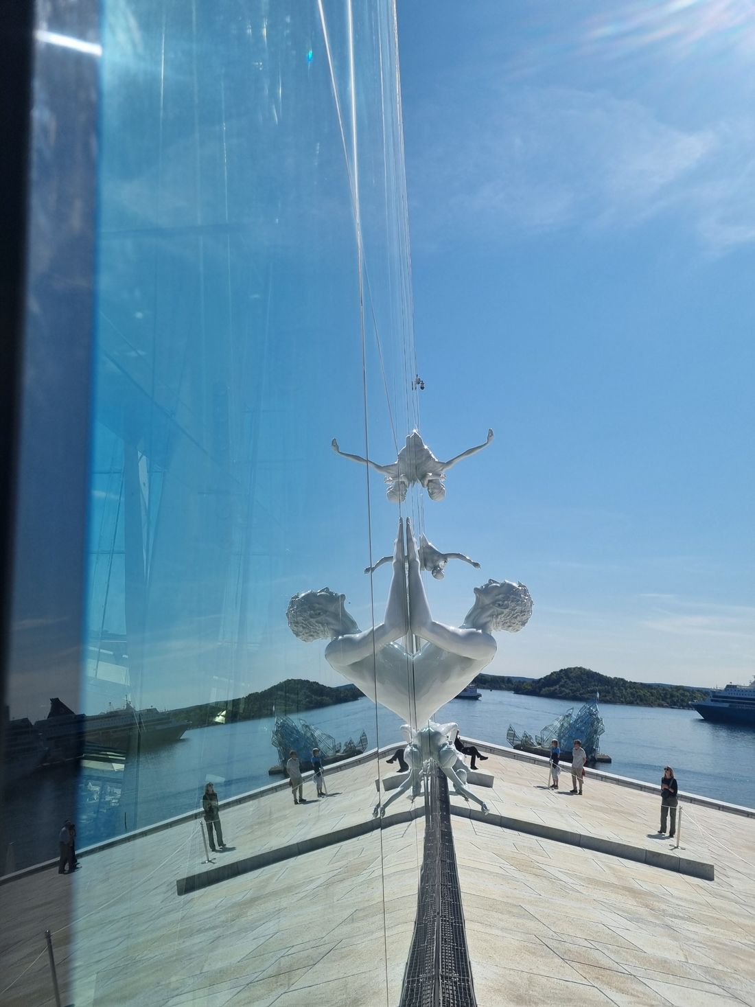 The sculptures must have be stuck or glued onto the windows, I could not really get close enough to tell, as the area was roped off with a security guard.