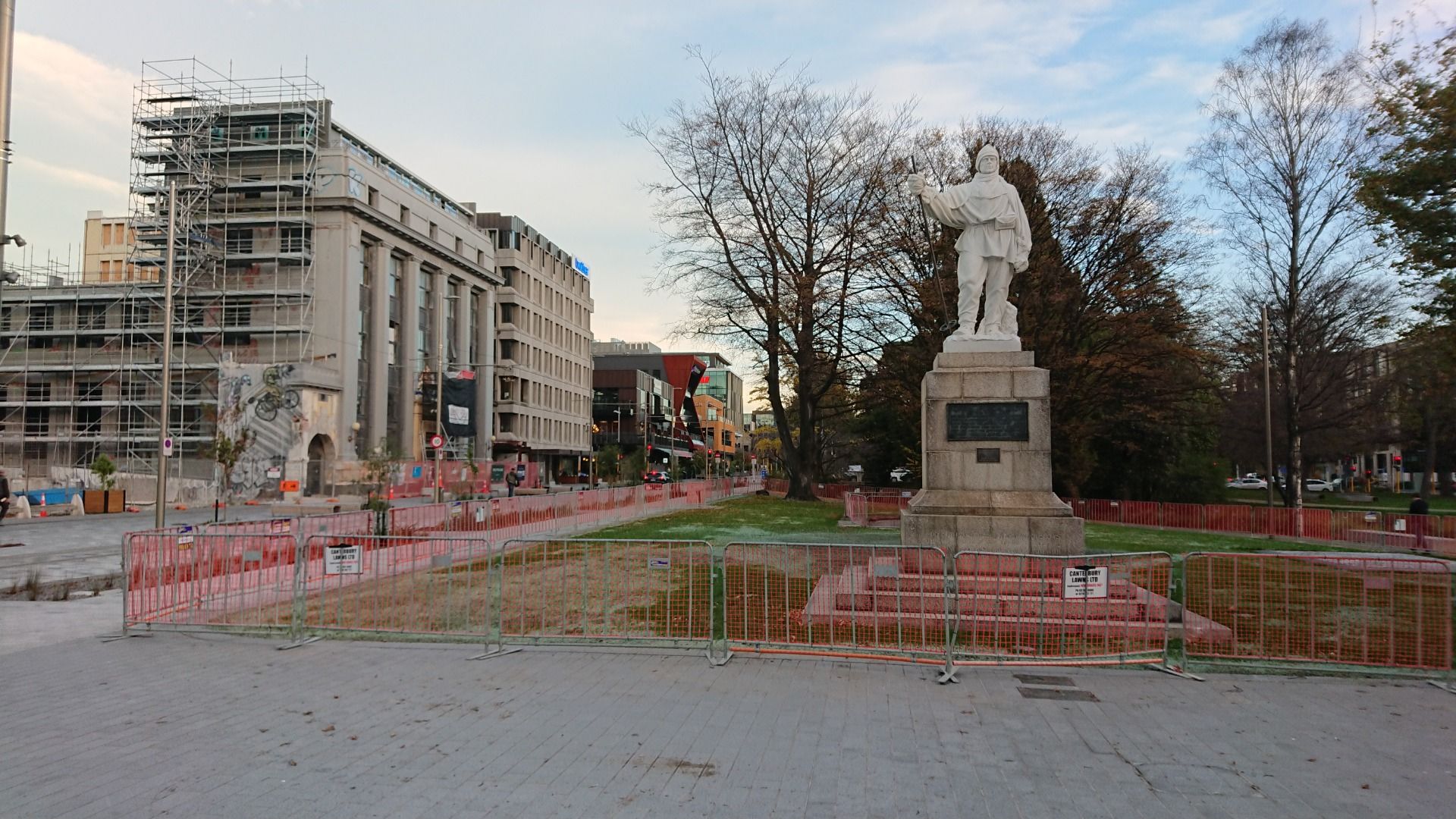 Other nearby structures and statues are still very much under guard with safety barriers 