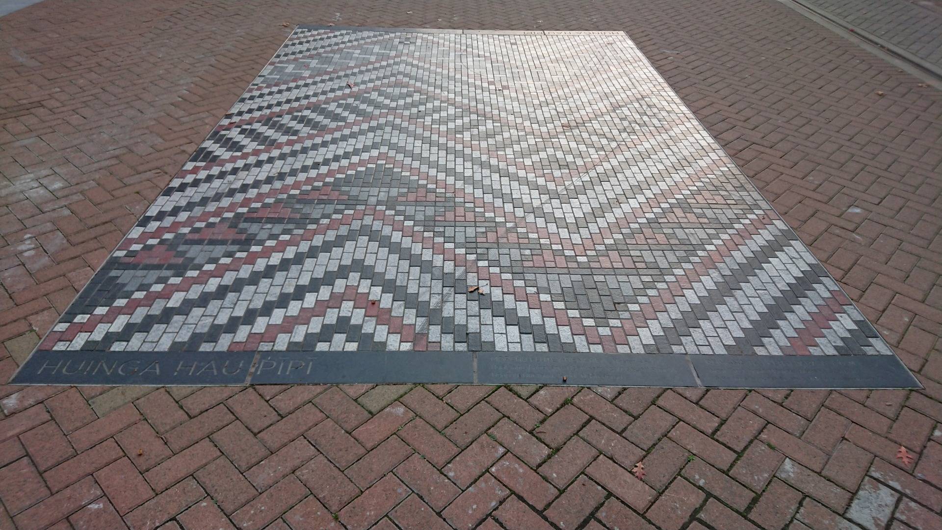 These "Welcome Mats" are dotted around the city on the bricks