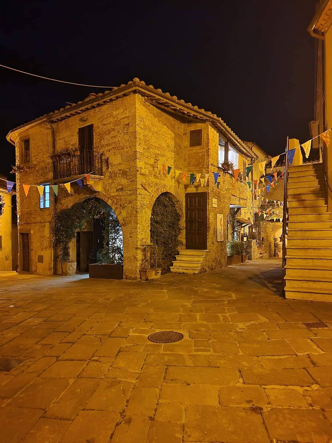The magical village of Montemerano by night.