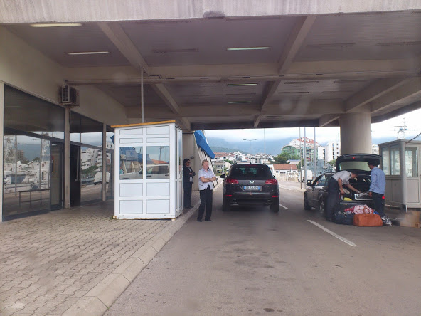 Customs @ Montenegro. Cars almost had to empty their trunks, fortunately I wasn’t asked to empty my luggage. That blond officer made things faster.