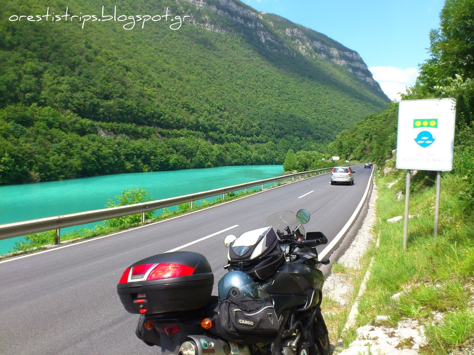 The sign reads ”OBCINA, KANAL OB SOCI”