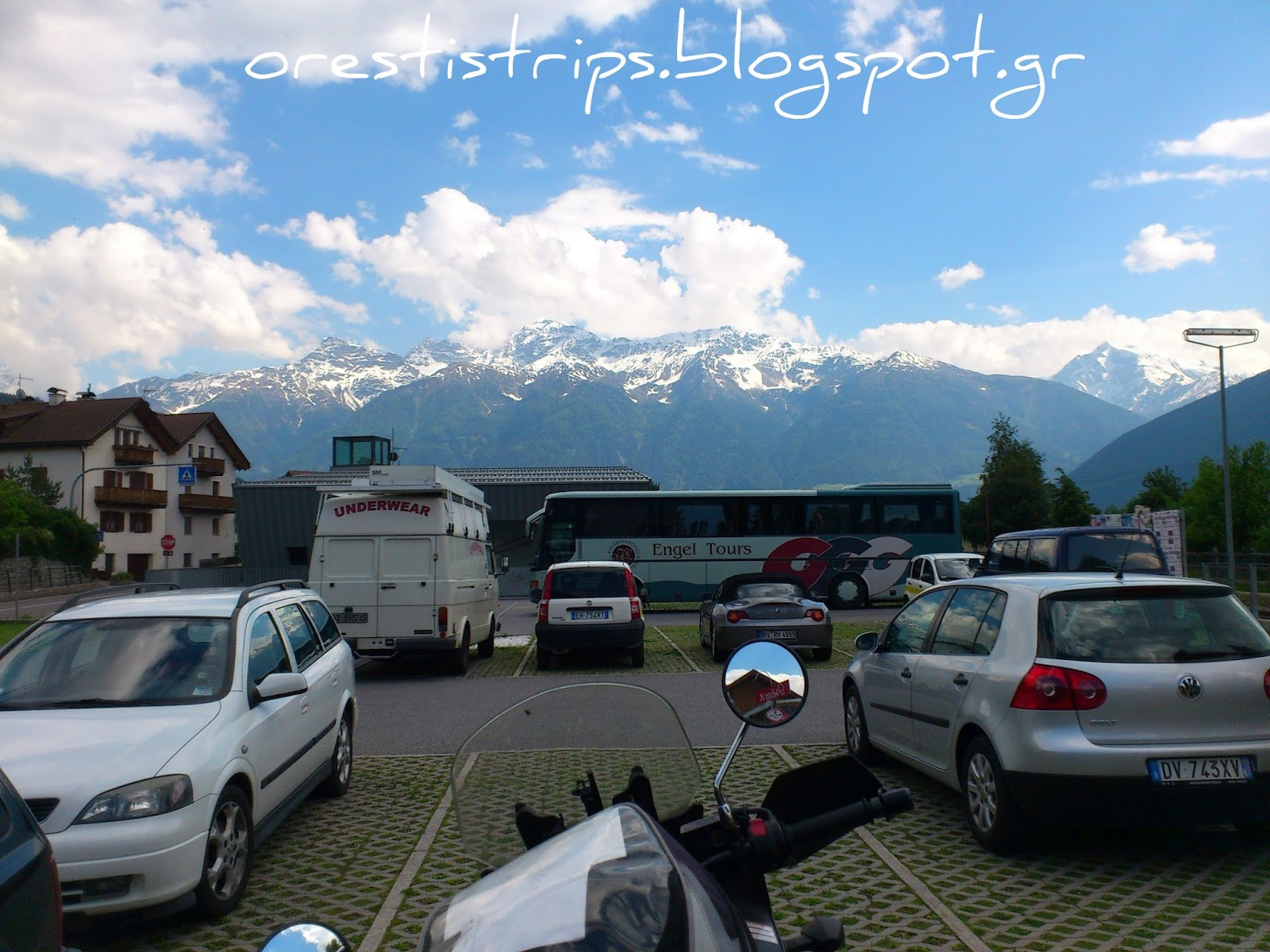 My bike watching the snowy peaks of Stelvio as I enjoy my lunch