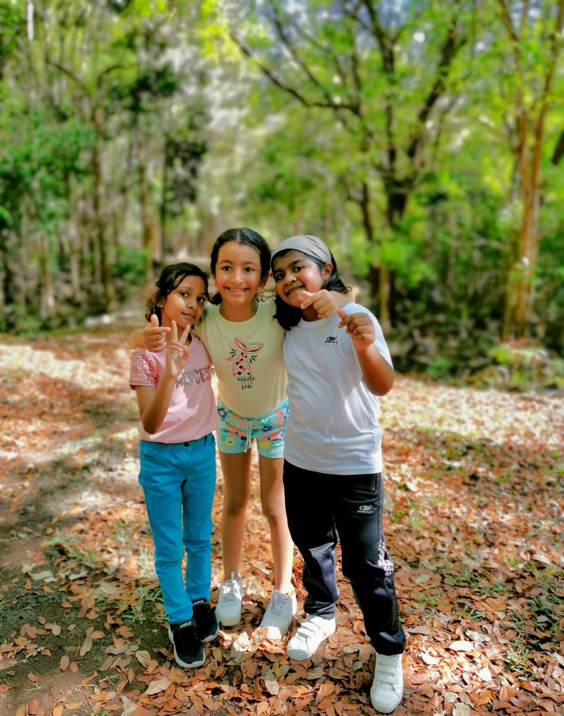 My daughter in the middle with her cousins; Sofia on the right of the picture and Afsheen on the left.