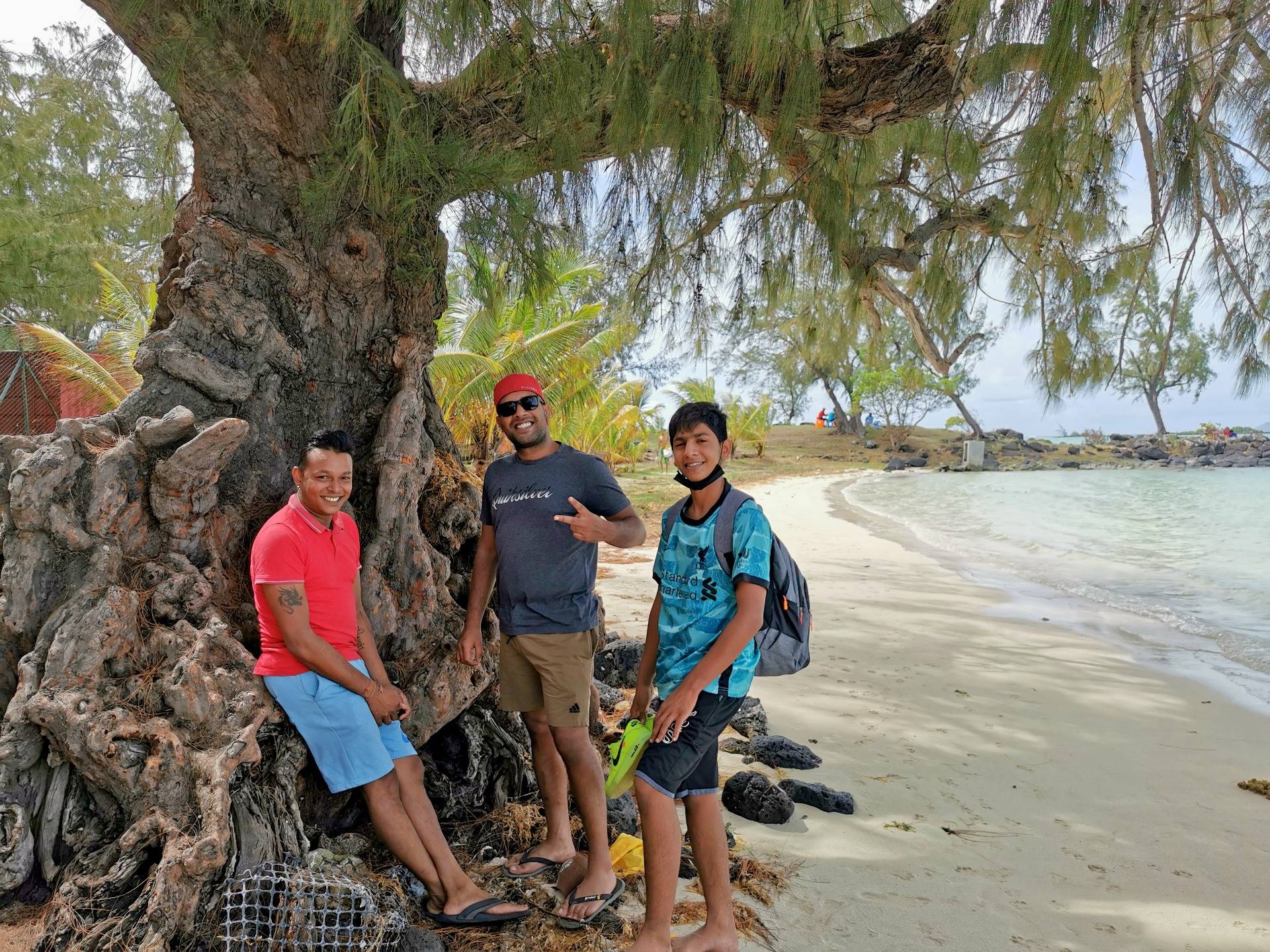 Niven, Arshaq and Zubair under the filao tree before entering the water...