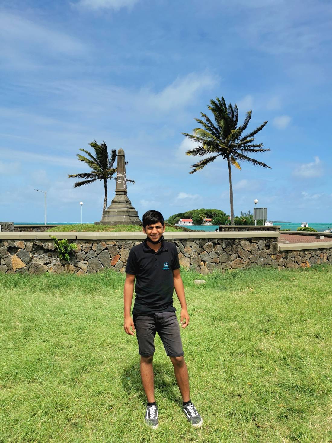 My nephew Zubair who is helping me at my restaurant since a month now, he is here posing in front of a memorial statue for people who died at sea...