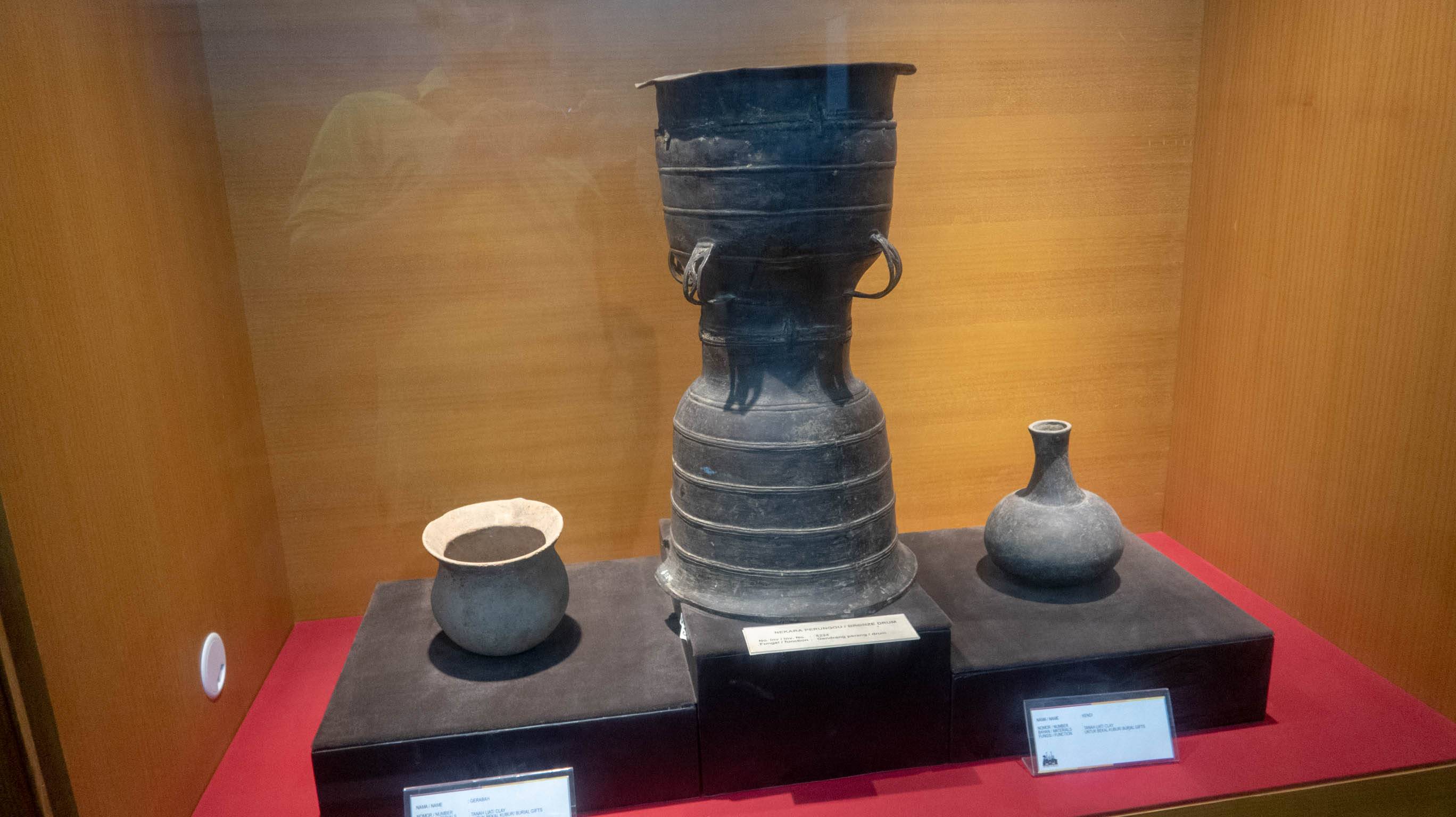 Bronze drum and bowls used for religious rituals.