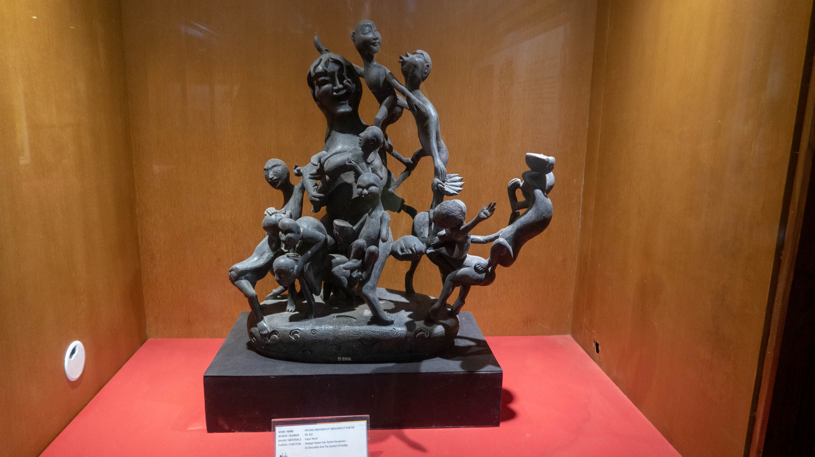 The statue of Men Brayut or Madam Brayut, a Balinese lady who had many children (in Karangasem Building).