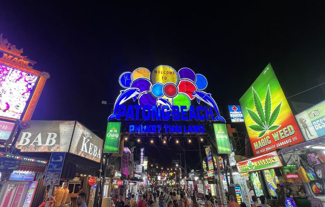 Bangla Road (daytime) known for its nightlife, transforms during the day into a calm area filled with cafés and shops, making it safe and suitable for a quick family stroll. 