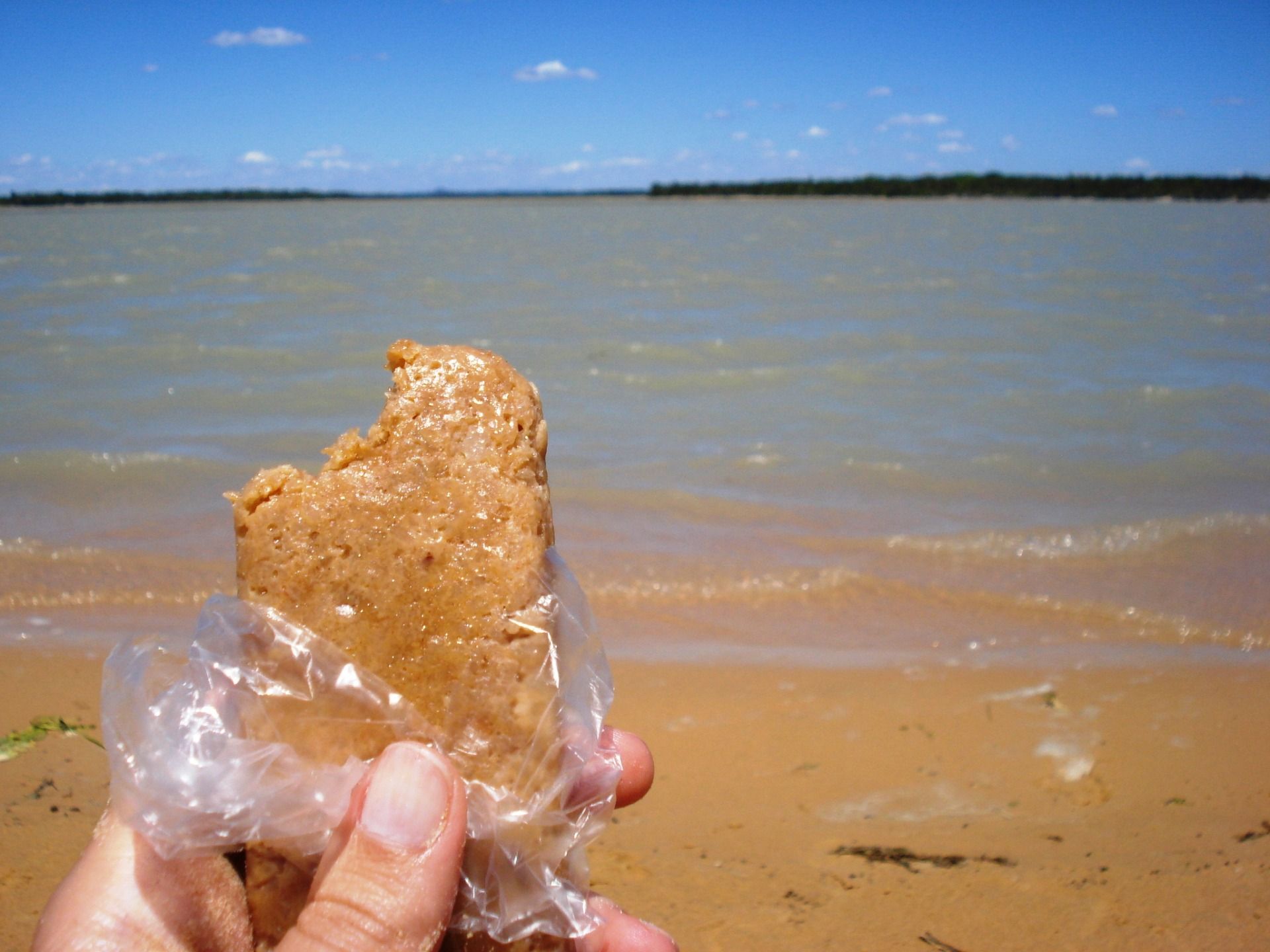 A boy sold me a delicious sweet made of milk on the beach of Tatajuba