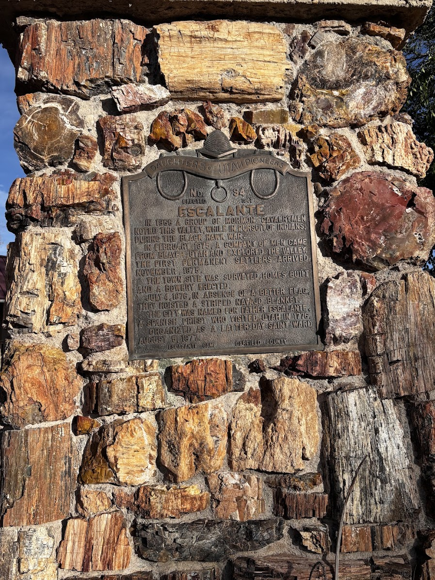 History of Escalante. Note the petrified logs which make the monument