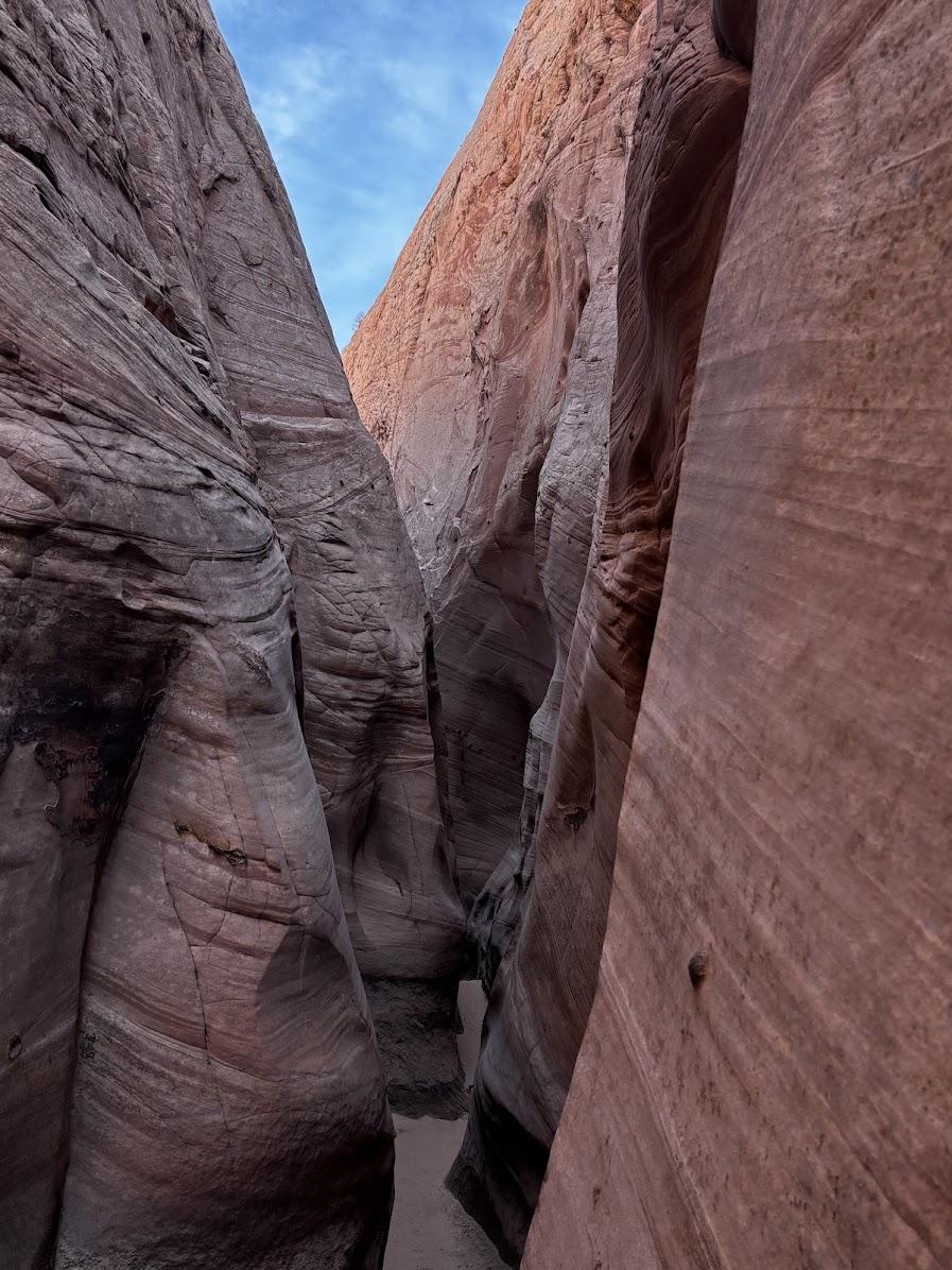 narrow passage between sandstone rocks in Zebra Slot Canyon, Utah