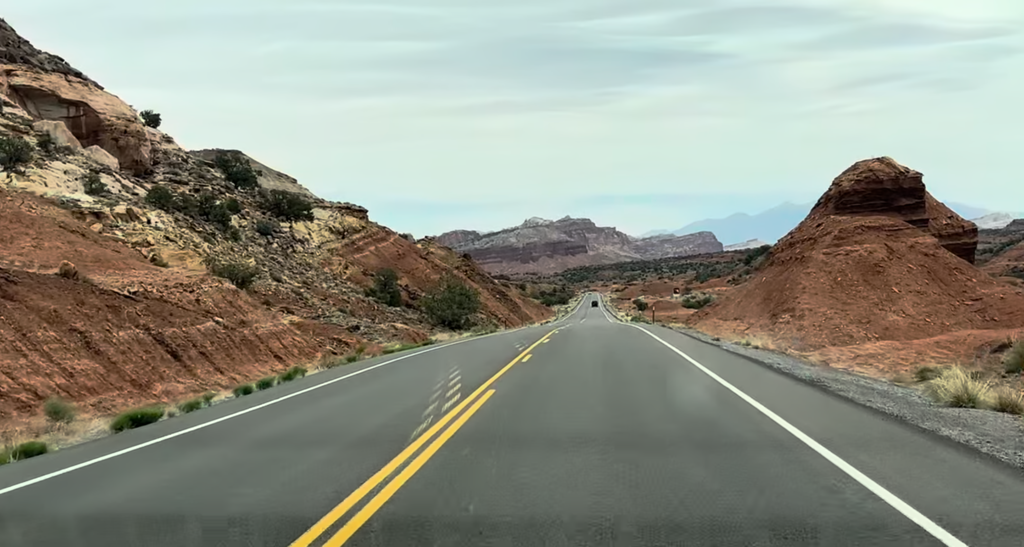 Utah hwy 24 cuts through layers of colorful sandstone