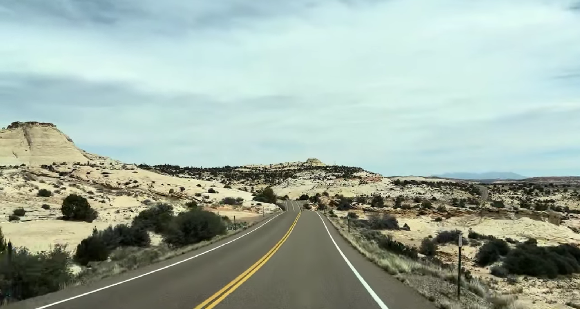 Utah hwy 12 cuts through white sandstone landscape