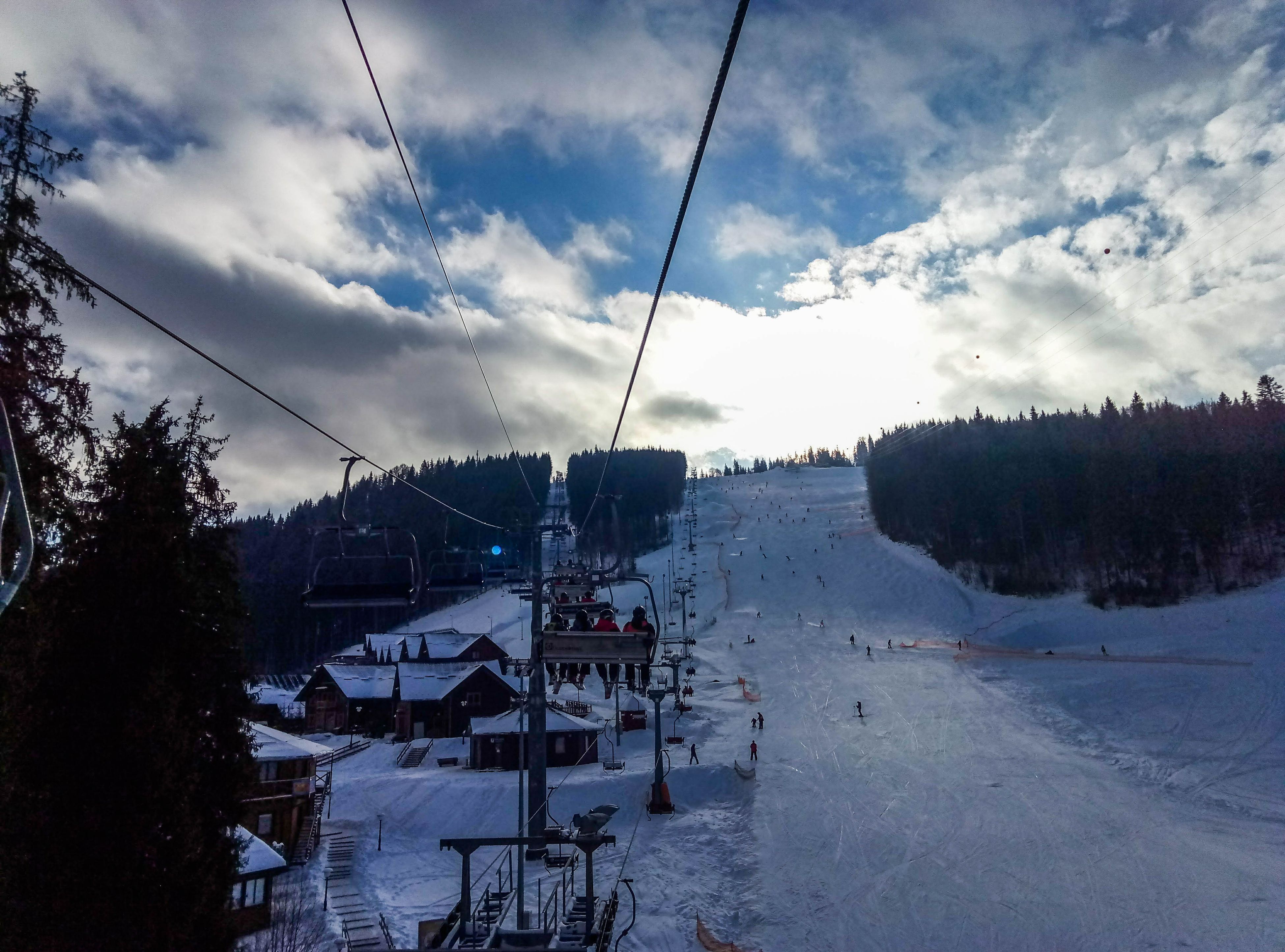 We climb the lift to the top of the mountain