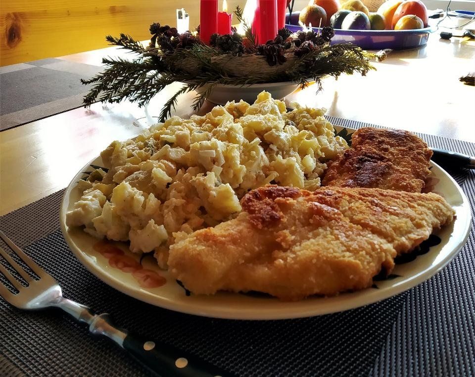 Christmas traditions of Czech Republic: crispy fried carp with potato salad